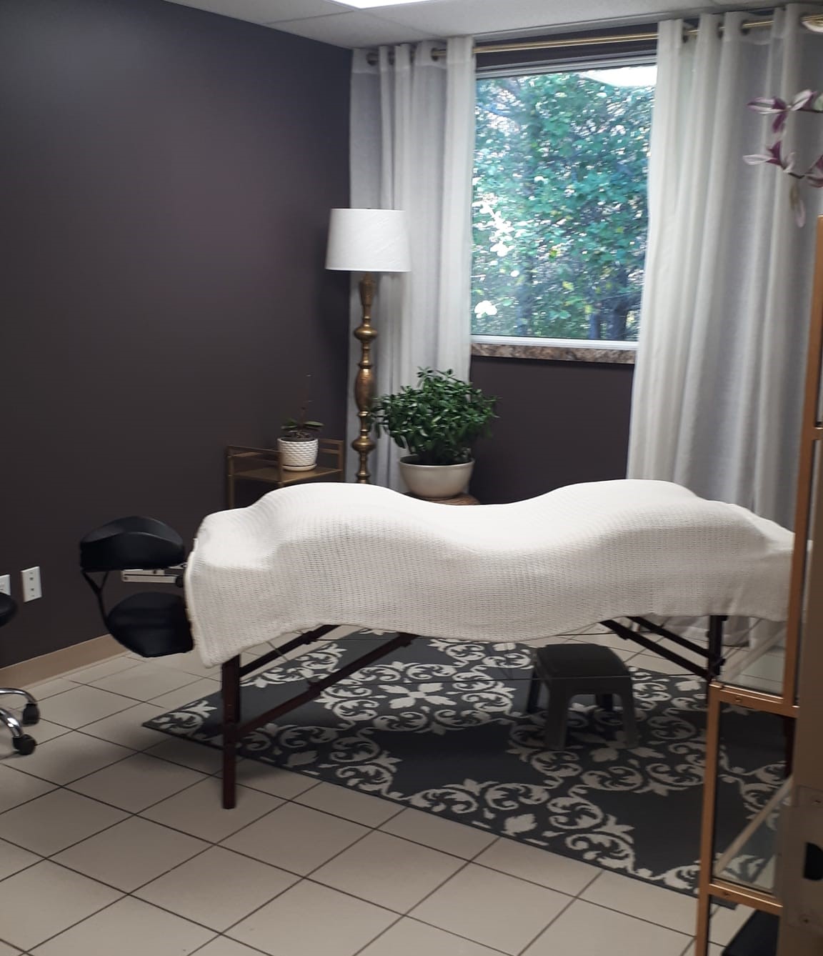 Softly lit wellness studio on Manitoulin, offering a peaceful space for relaxation and healing.